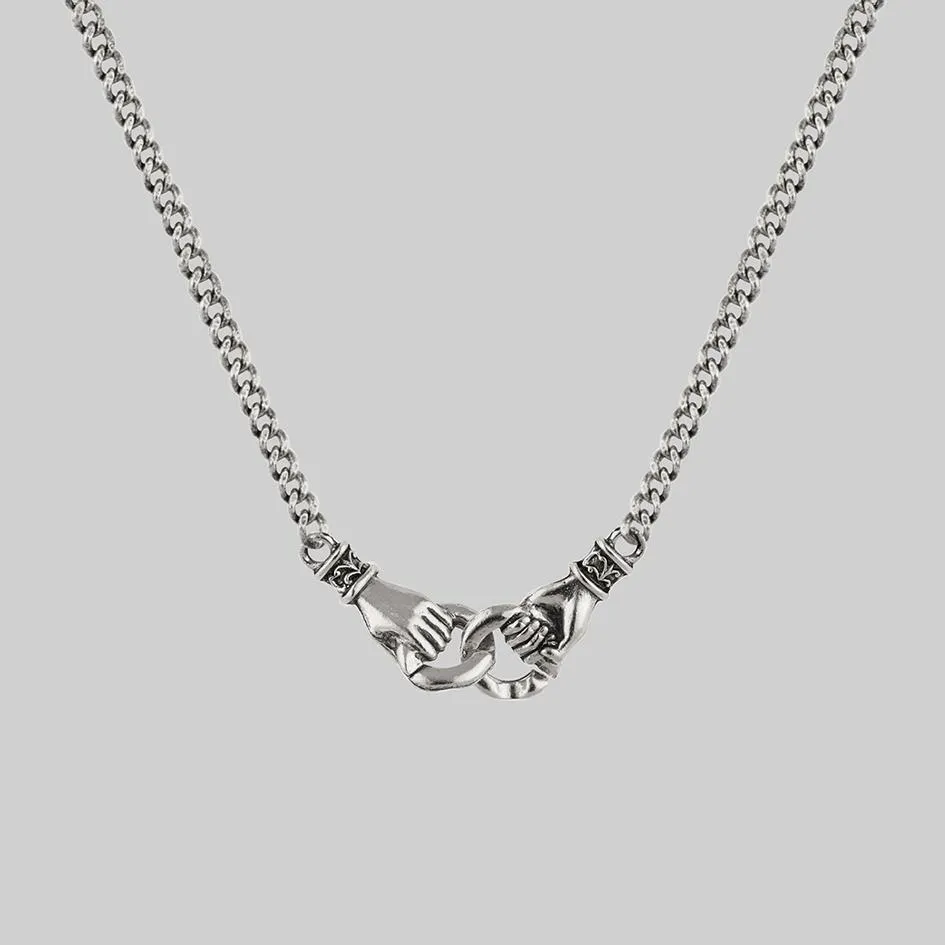 UNITY. Linking Hands Necklace - Silver