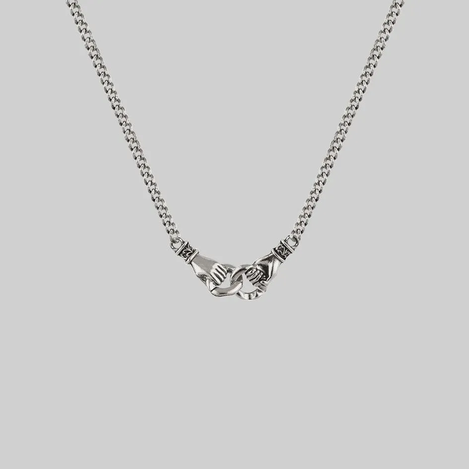 UNITY. Linking Hands Necklace - Silver